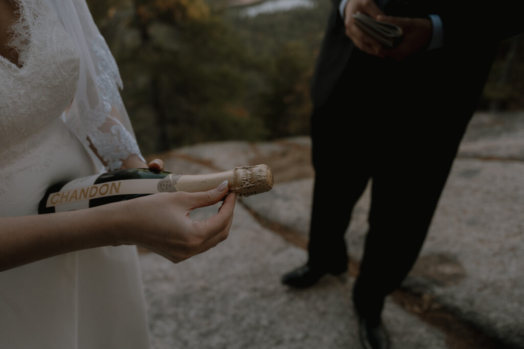 Couple kayaking during New Hampshire elopement adventure