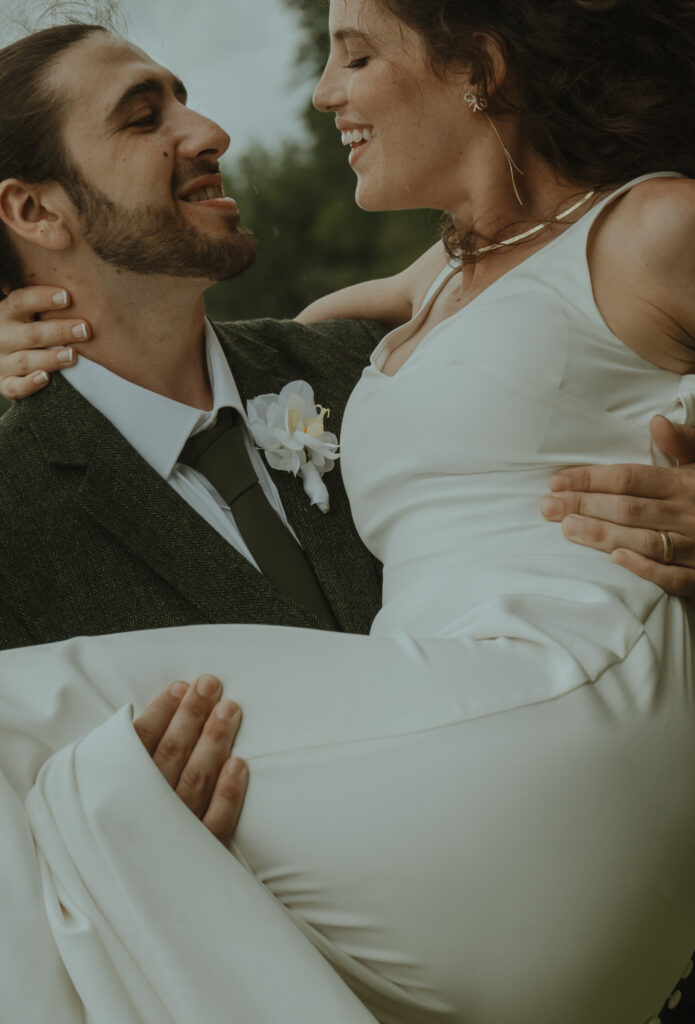 Bride and groom celebrating their mountain top New Hampshire Elopement