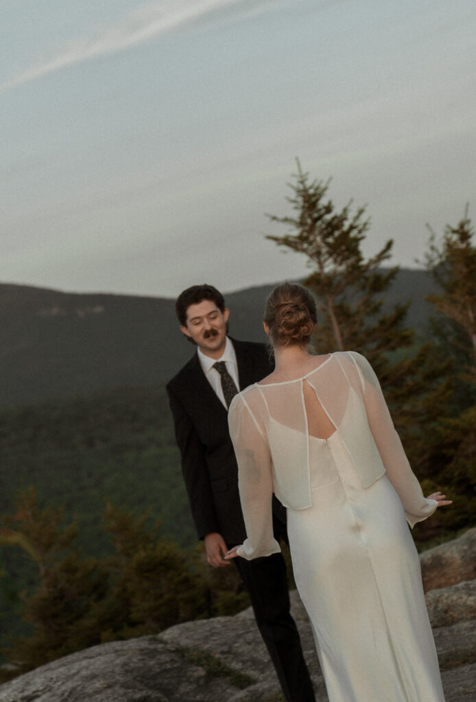 A magical first look at the top of a mountain in New Hampshire. This Sunrise elopement was perfect.