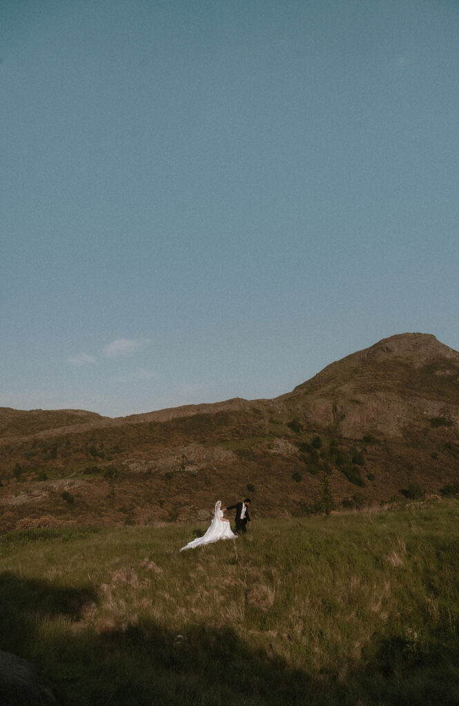 Bride and Groom exploring the Scotland Hills during their elopement in Scotland