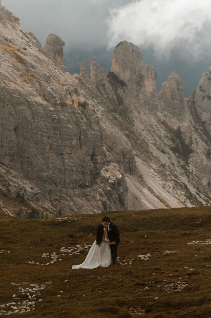Bride and Groom hiking Cadini during their Dolomites Elopement.